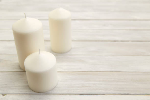 istock Candles placed on wooden boards. 1067035782