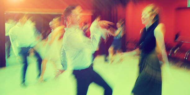 istock Motion blur of dancing couples 1067038146