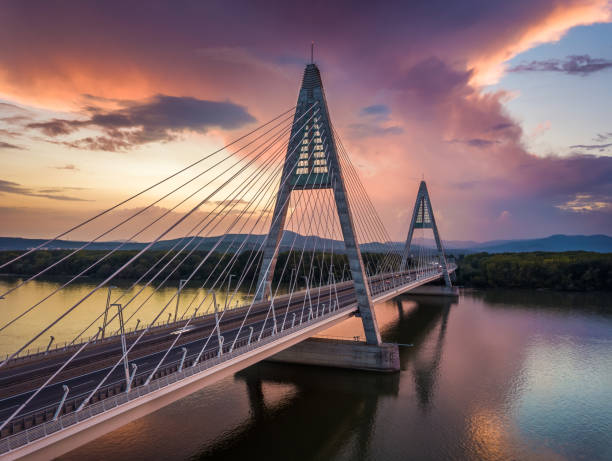 istock Budapest, Hungary - Megyeri Bridge over River Danube at sunset with beautiful dramatic clouds 1067038246