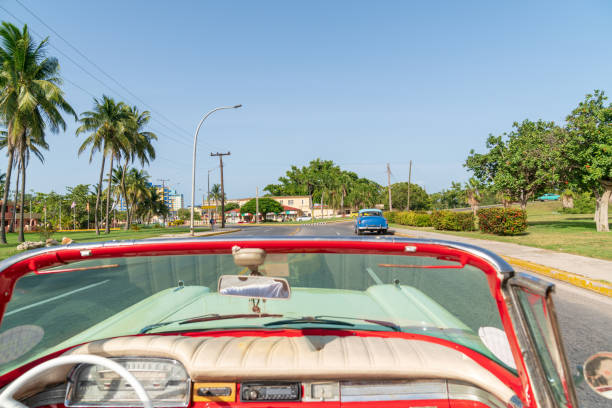 istock Cityscape view inside an old vintage american car 1067038654