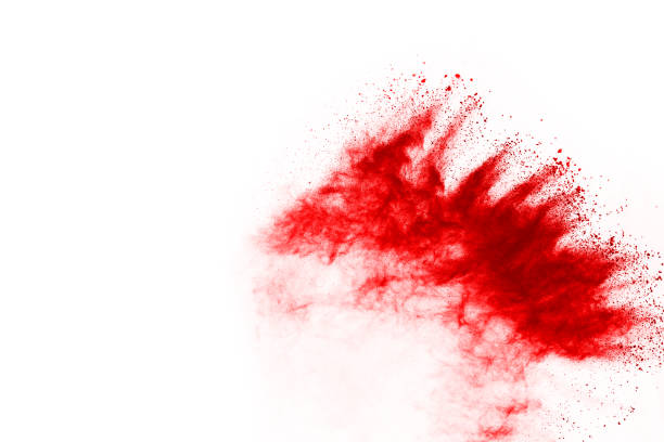 istock Freeze motion of red powder exploding, isolated on white background. Abstract design of red dust cloud. Particles explosion screen saver, wallpaper 1067038666