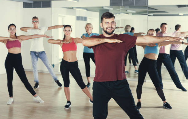 istock adults of different ages dancing at dance class 1067040408