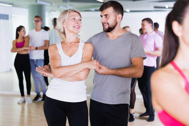 istock Glad dancing pair dance waltz  together 1067040462