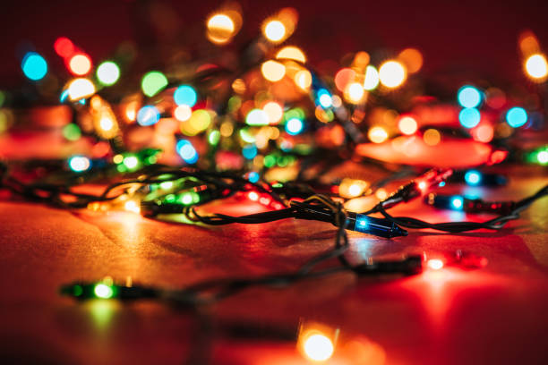 istock Shining colourful garlands as christmas background 1067040838