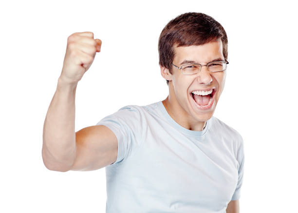 Excited man celebrating win - fotografia de stock