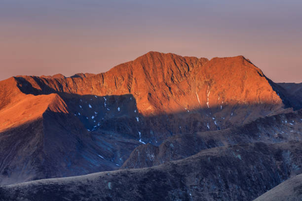 istock Moldoveanu Peak in sunrise 1067054542