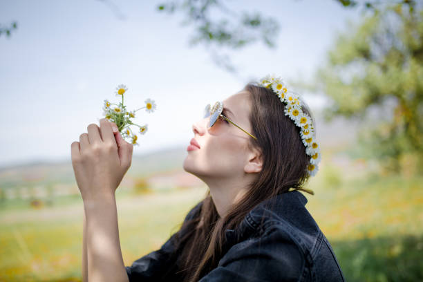 female model photography between flowers