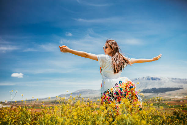 istock female model photography between flowers 1067055054