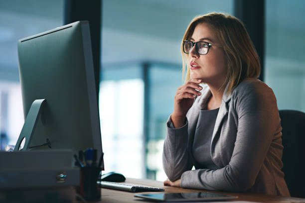 istock Putting her mind to completing the deadline 1067060284