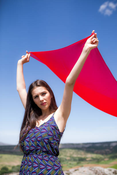 istock woman meditating in nature 1067061514