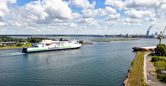 Warnemünde, Germany - July 14, 2017: The modern ferry with the name Berlin of the shipping company Scandlines enters the port of Rostock. The ferry line connects the German port of Rostock with Gedser in Denmark.