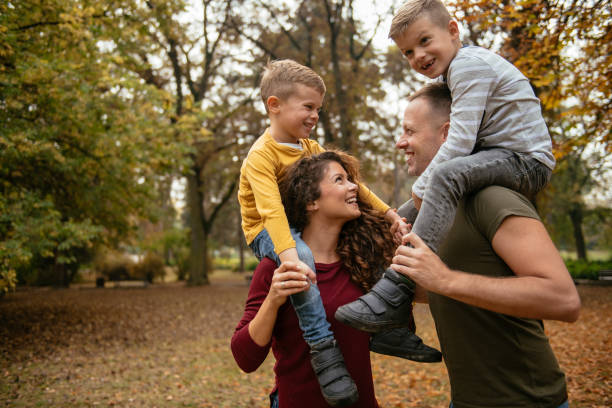 istock Family having fun in park 1067067286