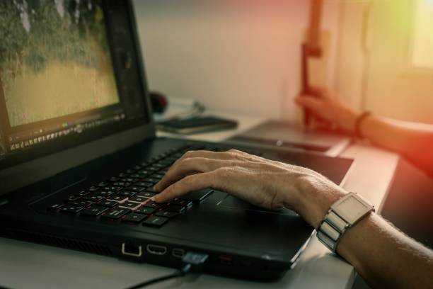 istock hands of girl working with computer laptop 1067067912