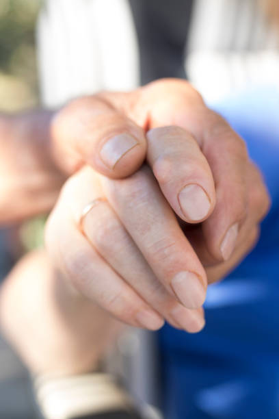 istock couple of older hands linked 1067071160