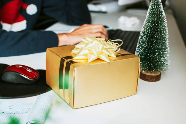 istock christmas gift box on the office desk 1067071174