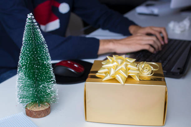 istock christmas gift box in office or home desk 1067071178