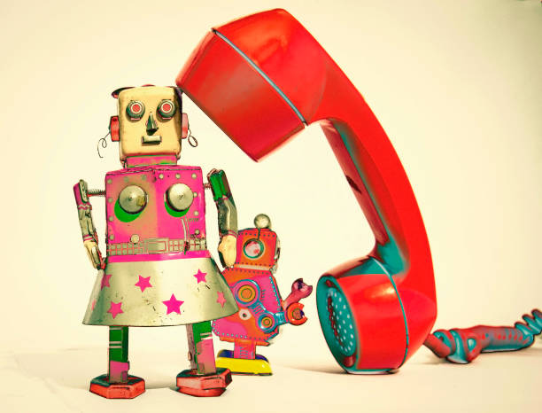 istock robots on the phone  close up 1067072386
