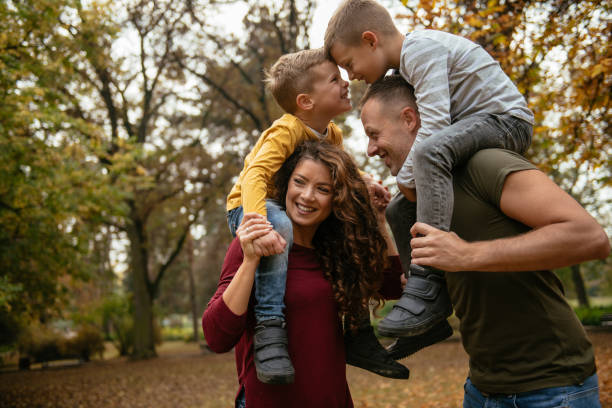 istock Family having fun in park 1067079680