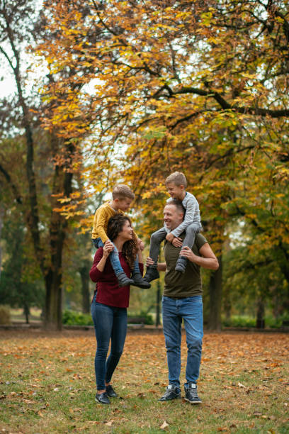 istock Family having fun in park 1067079912