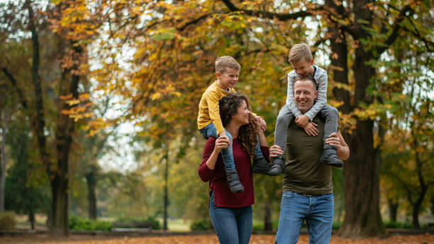 istock Family having fun in park 1067080572