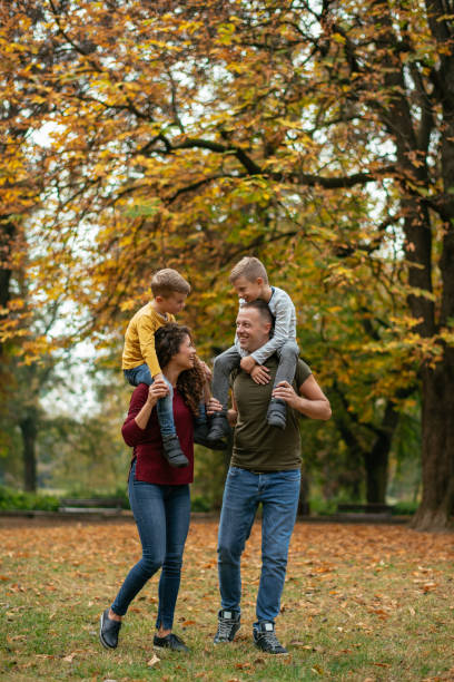 istock Family having fun in park 1067084398