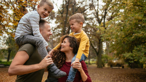 istock Family having fun in park 1067084832
