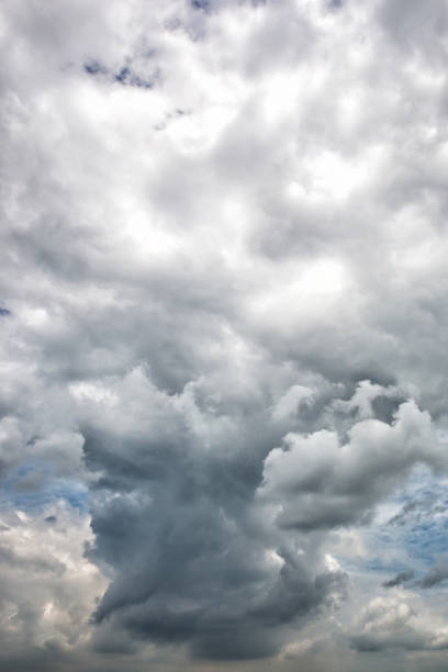 istock Fluffy dark cloud in the sky. rainy dense cloud before rain. 1067085158