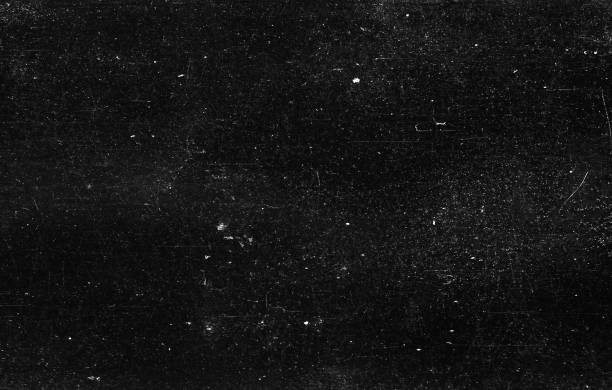 Old Scratched Film Strip Grunge Texture Background A close-up scan of an old scratched 35mm film strip grunge texture background. film industry stock pictures, royalty-free photos & images