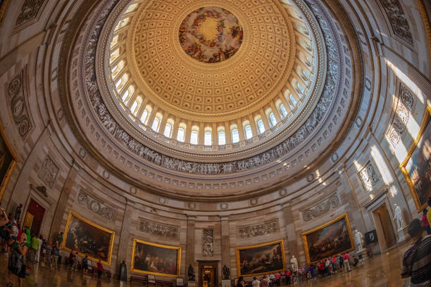 Interior of the Washington Capitol hill dome, Washington DC Washington DC: Interior of the Washington Capitol hill dome. Rotunda with tourists. rotunda stock pictures, royalty-free photos & images