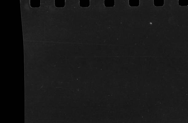 Old Scratched 35mm Film Strip Grunge Texture Background stock photo