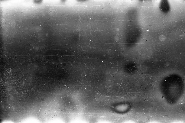 Old Scratched 35mm Film Strip Grunge Texture Background stock photo