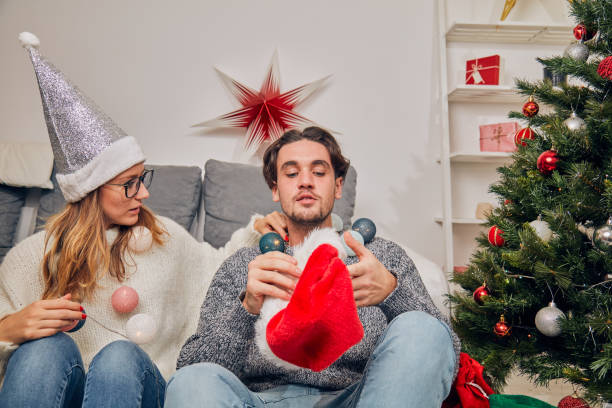 istock Couple preparing for New Year's / Christmas eve. 1067097812