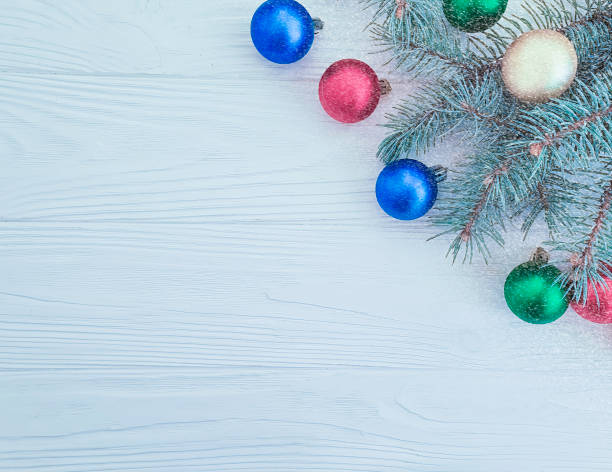 istock Christmas ball, tree on a wooden background 1067101466