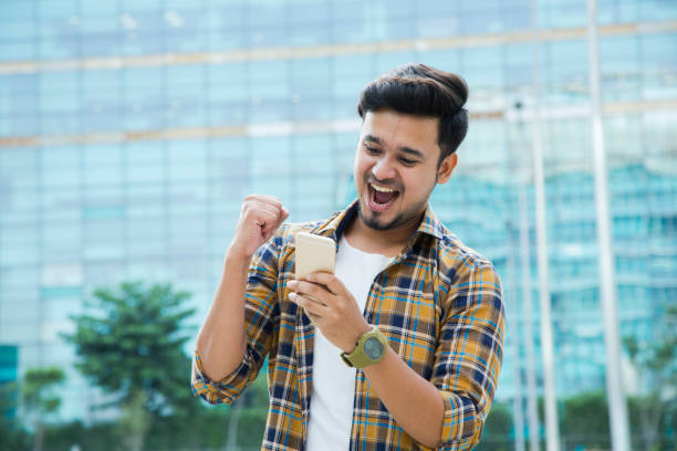 istock Texting on the street - Stock image 1067102310