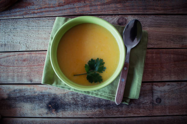 istock Pumpkin soup in ceramic bowl 1067104316