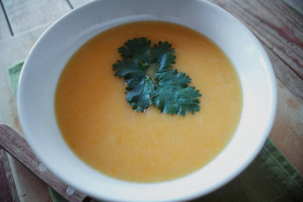 istock Pumpkin soup in ceramic bowl 1067104318