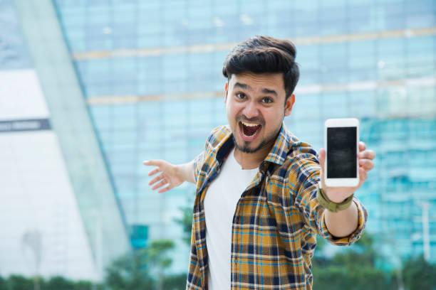 istock Showing Phone Screen - Stock Images 1067105060