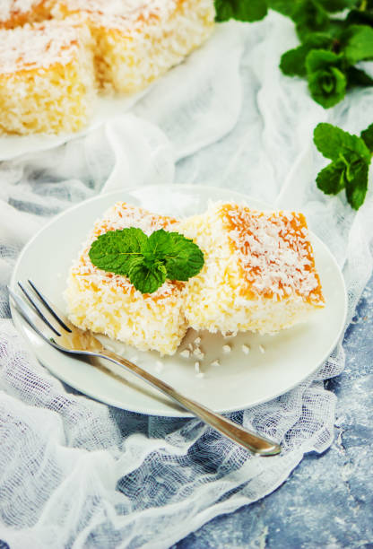 istock Cakes in coconut shavings. Selective focus. Food. 1067110546