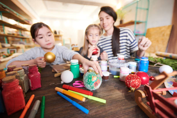 istock Kids in Christmas Art Class 1067120112