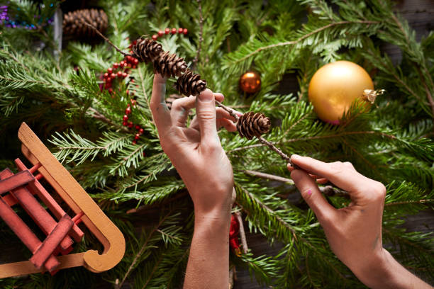 istock Woman Making Handmade Fir Wreath 1067120182