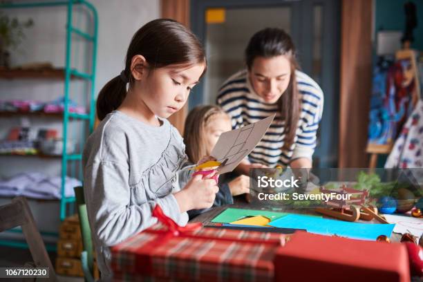 Girl Making Handmade Presents Stock Photo - Download Image Now - Child, Craft, Making