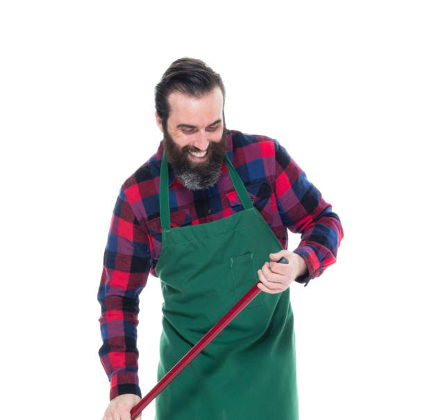 istock Man wearing green apron 1067126050