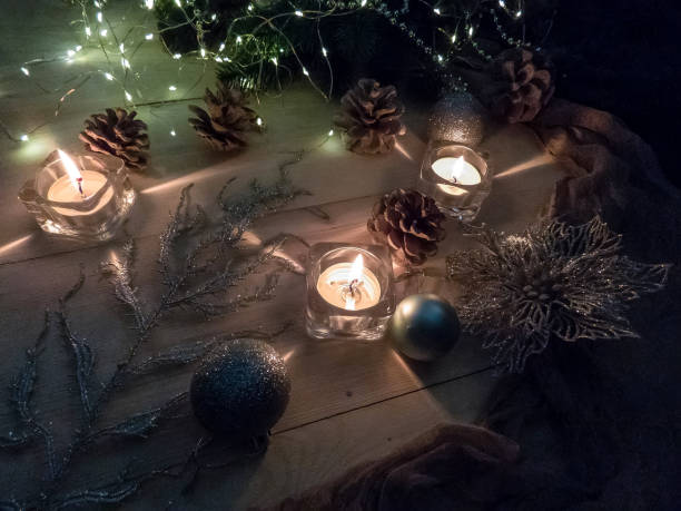 istock Dark color luxury background. Candles on black table top view. Premium horizontal design. 1067126662