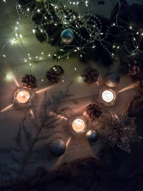 istock Dark color luxury background. Candles on black table top view. Premium horizontal design. 1067126772