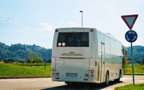 istock White Tourist bus on road in Poland 1067134010