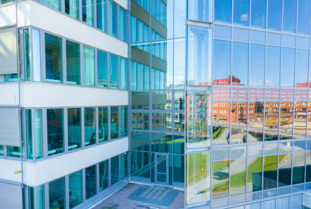 istock Bright future, finance building, reflection in windows 1067134420