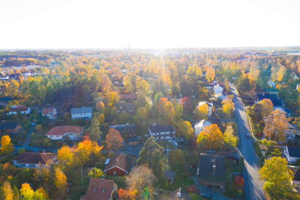 istock Flying over villa and tree area just at sunset 1067135586