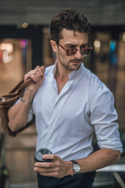 istock Charming businessman holding a bag 1067143178