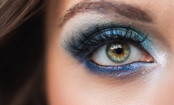 istock Woman wearing professional make-up 1067143994