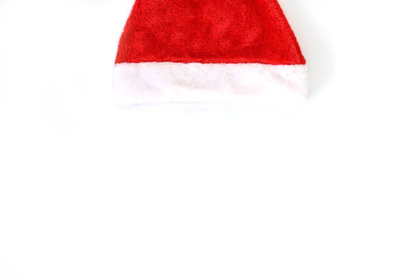 istock Single Santa Claus red hat with top view isolated on white background 1067144352